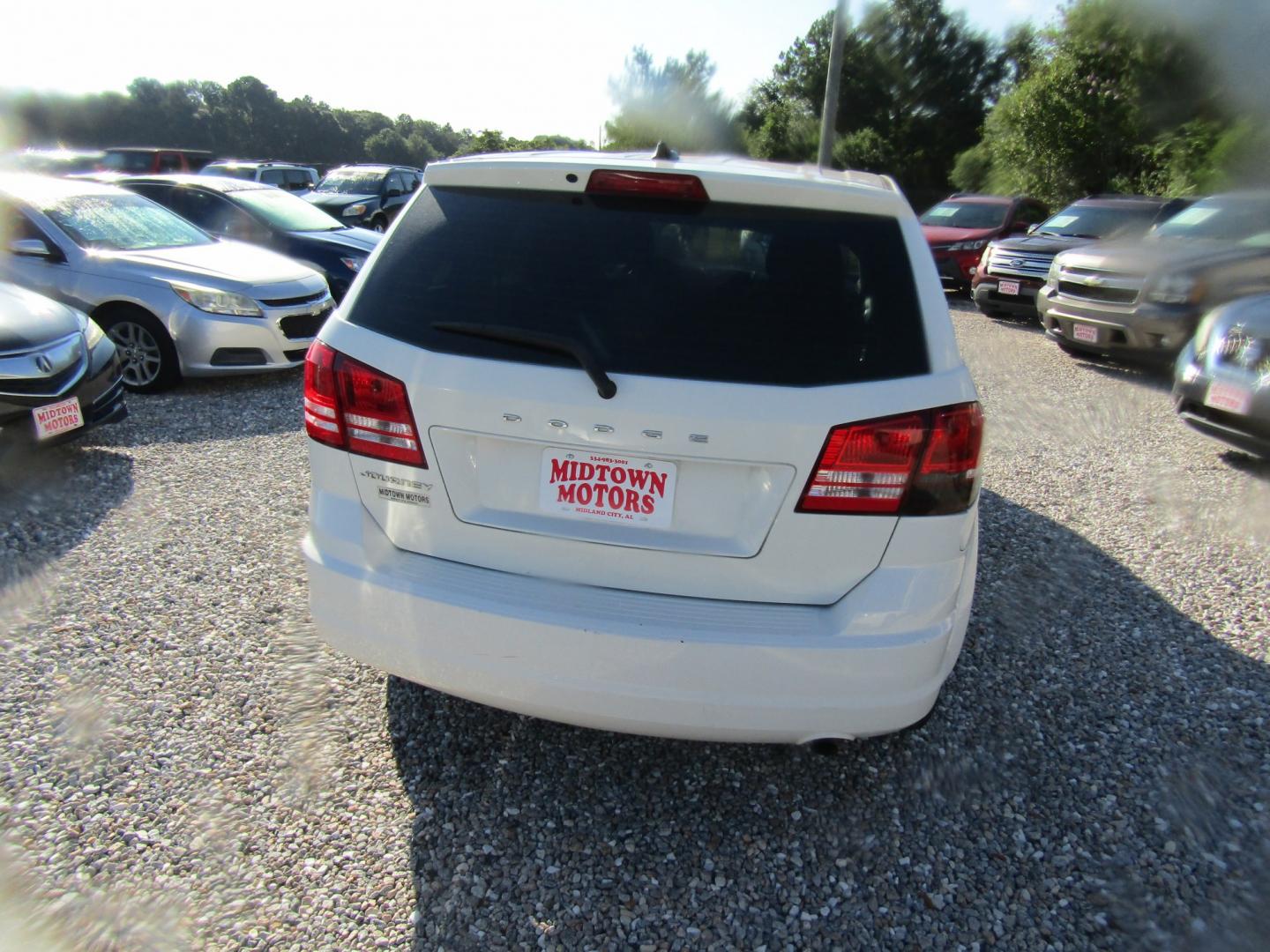 2013 White Dodge Journey SE (3C4PDCAB2DT) with an 2.4L L4 DOHC 16V engine, Automatic transmission, located at 15016 S Hwy 231, Midland City, AL, 36350, (334) 983-3001, 31.306210, -85.495277- Photo#5
