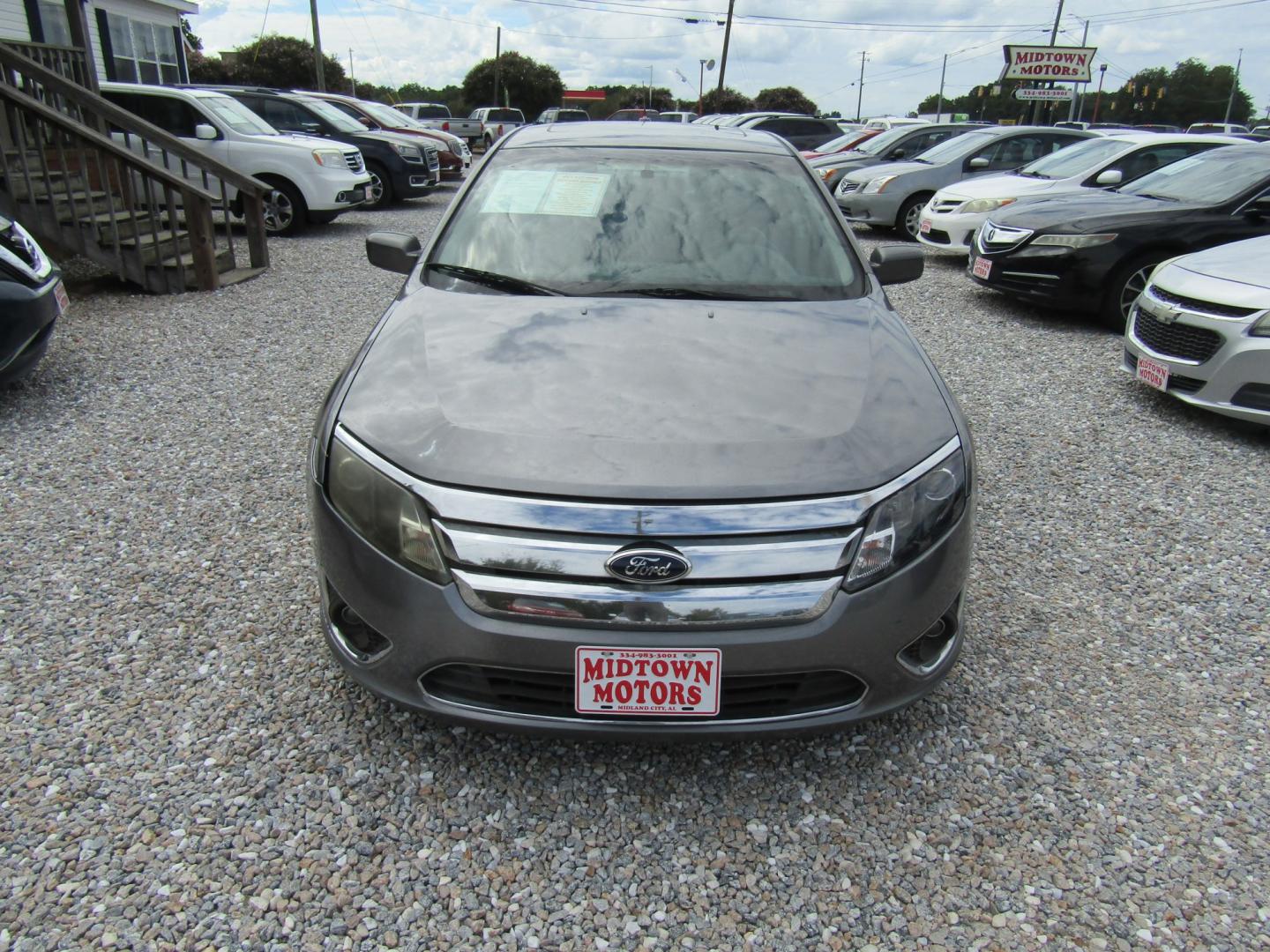 2012 Gray Ford Fusion SEL (3FAHP0JA9CR) with an 2.5L L4 DOHC 16V engine, Automatic transmission, located at 15016 S Hwy 231, Midland City, AL, 36350, (334) 983-3001, 31.306210, -85.495277- Photo#0