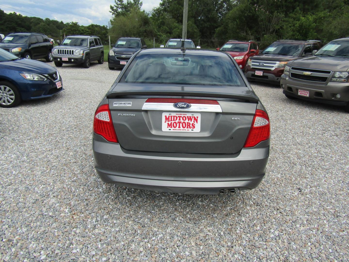 2012 Gray Ford Fusion SEL (3FAHP0JA9CR) with an 2.5L L4 DOHC 16V engine, Automatic transmission, located at 15016 S Hwy 231, Midland City, AL, 36350, (334) 983-3001, 31.306210, -85.495277- Photo#5