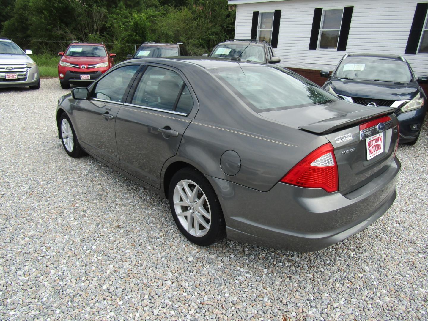 2012 Gray Ford Fusion SEL (3FAHP0JA9CR) with an 2.5L L4 DOHC 16V engine, Automatic transmission, located at 15016 S Hwy 231, Midland City, AL, 36350, (334) 983-3001, 31.306210, -85.495277- Photo#4