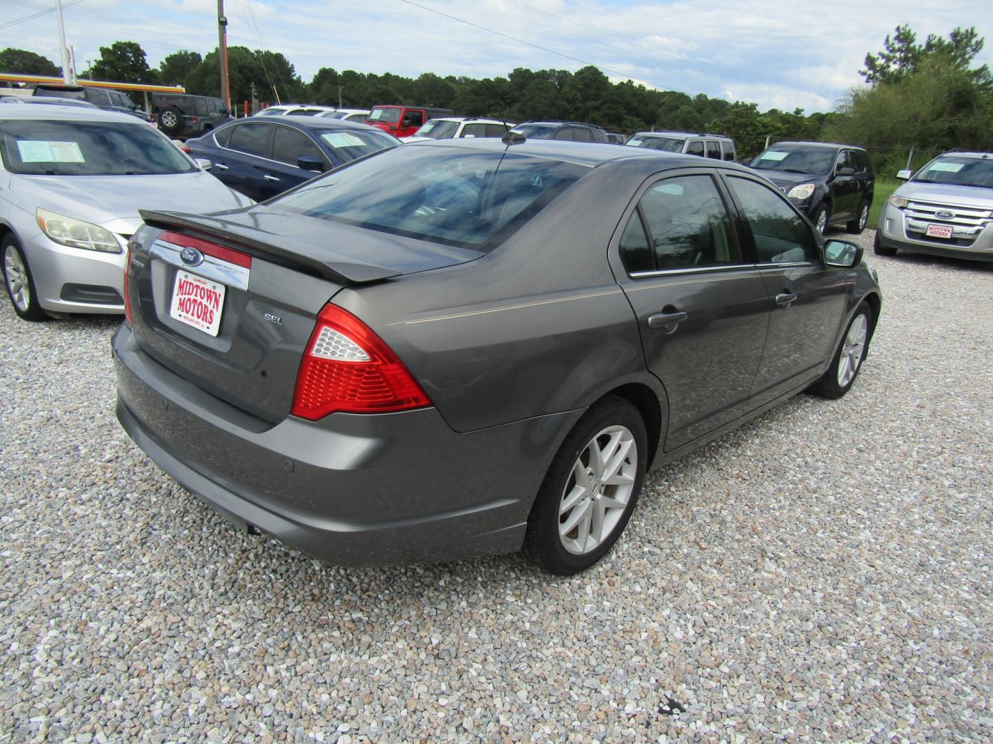 2012 Gray Ford Fusion SEL (3FAHP0JA9CR) with an 2.5L L4 DOHC 16V engine, Automatic transmission, located at 15016 S Hwy 231, Midland City, AL, 36350, (334) 983-3001, 31.306210, -85.495277- Photo#6