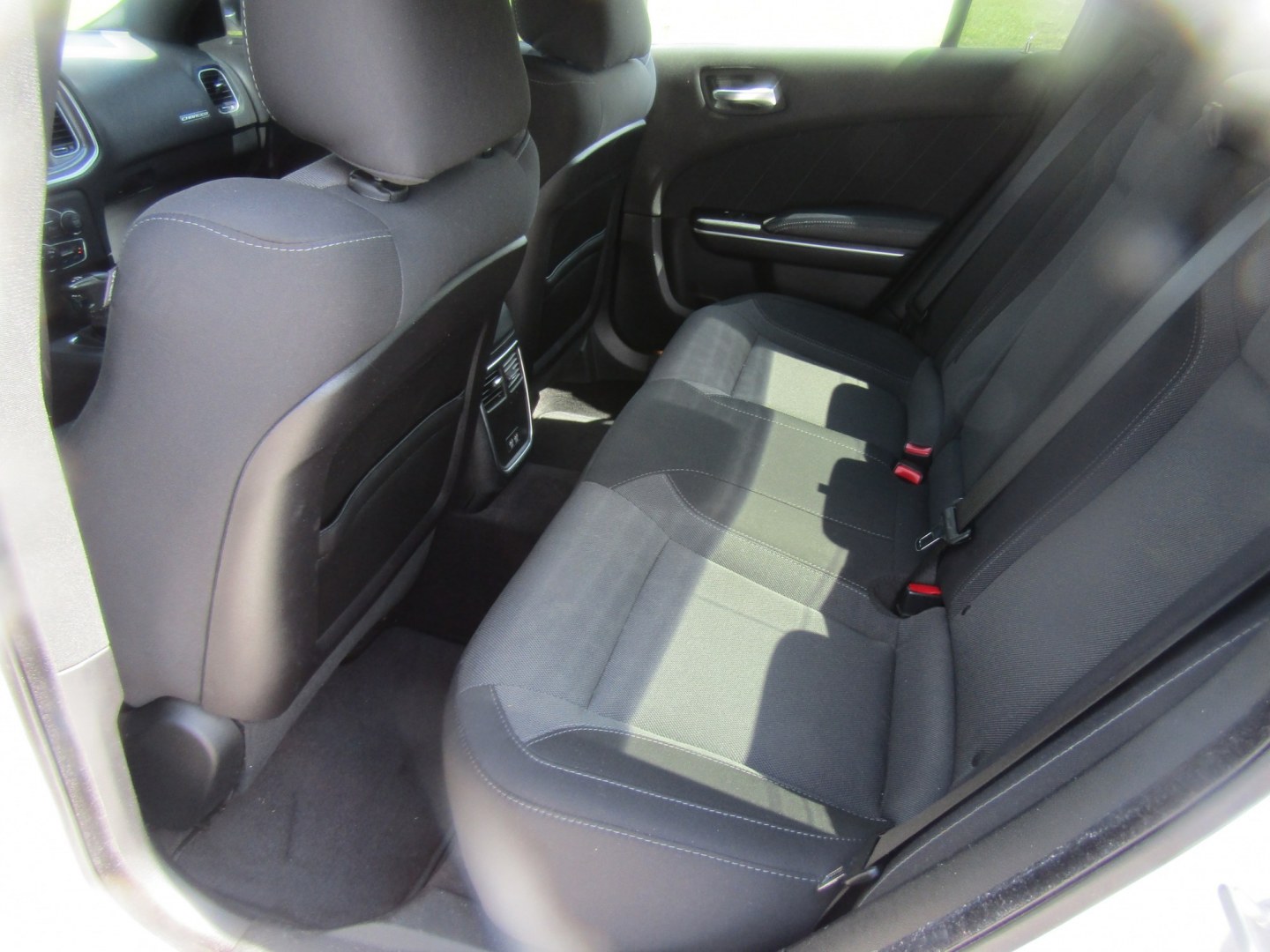 2019 White Dodge Charger SXT (2C3CDXBGXKH) with an 3.6L V6 DOHC 24V engine, Automatic transmission, located at 15016 S Hwy 231, Midland City, AL, 36350, (334) 983-3001, 31.306210, -85.495277- Photo#2