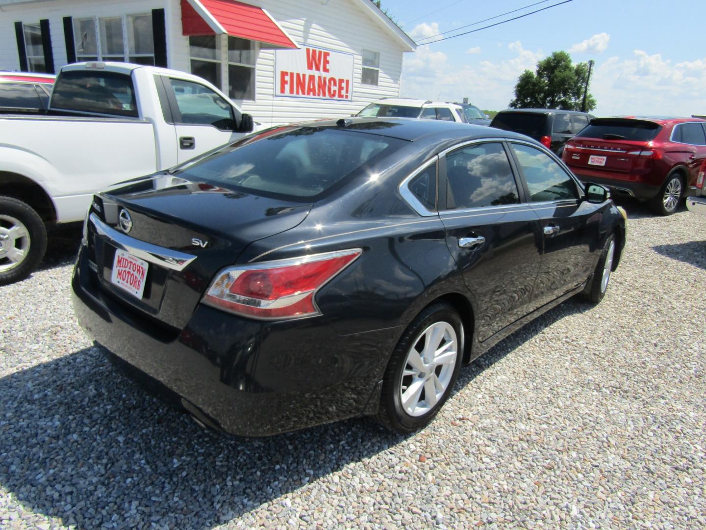 2015 Blue Nissan Altima 2.5 S (1N4AL3AP4FC) with an 2.5L L4 DOHC 16V engine, Automatic transmission, located at 15016 S Hwy 231, Midland City, AL, 36350, (334) 983-3001, 31.306210, -85.495277- Photo#7