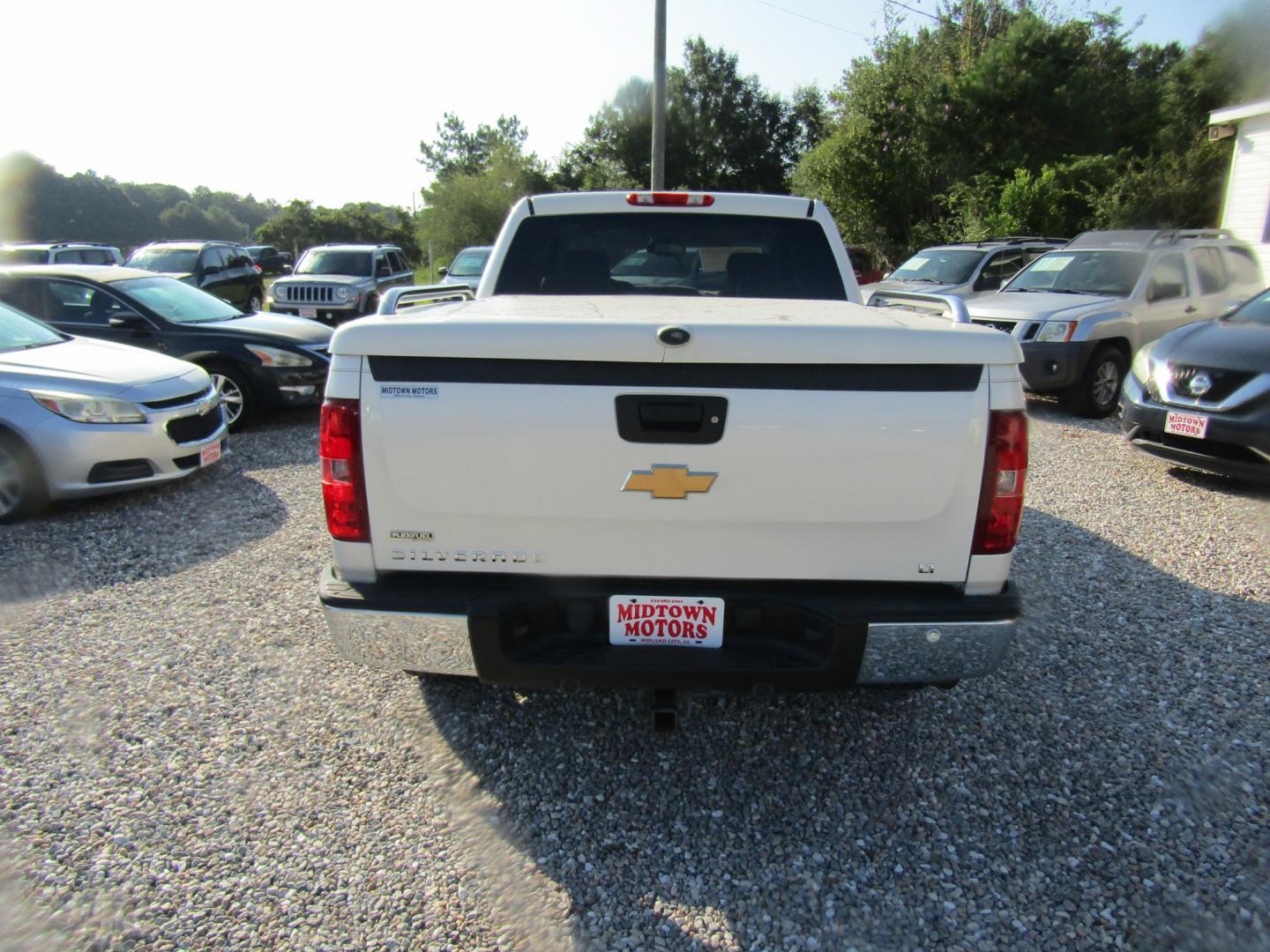 2012 White Chevrolet Silverado 1500 LT Crew Cab 4WD (3GCPKSE73CG) with an 5.3L V8 OHV 16V FFV engine, Automatic transmission, located at 15016 S Hwy 231, Midland City, AL, 36350, (334) 983-3001, 31.306210, -85.495277- Photo#4