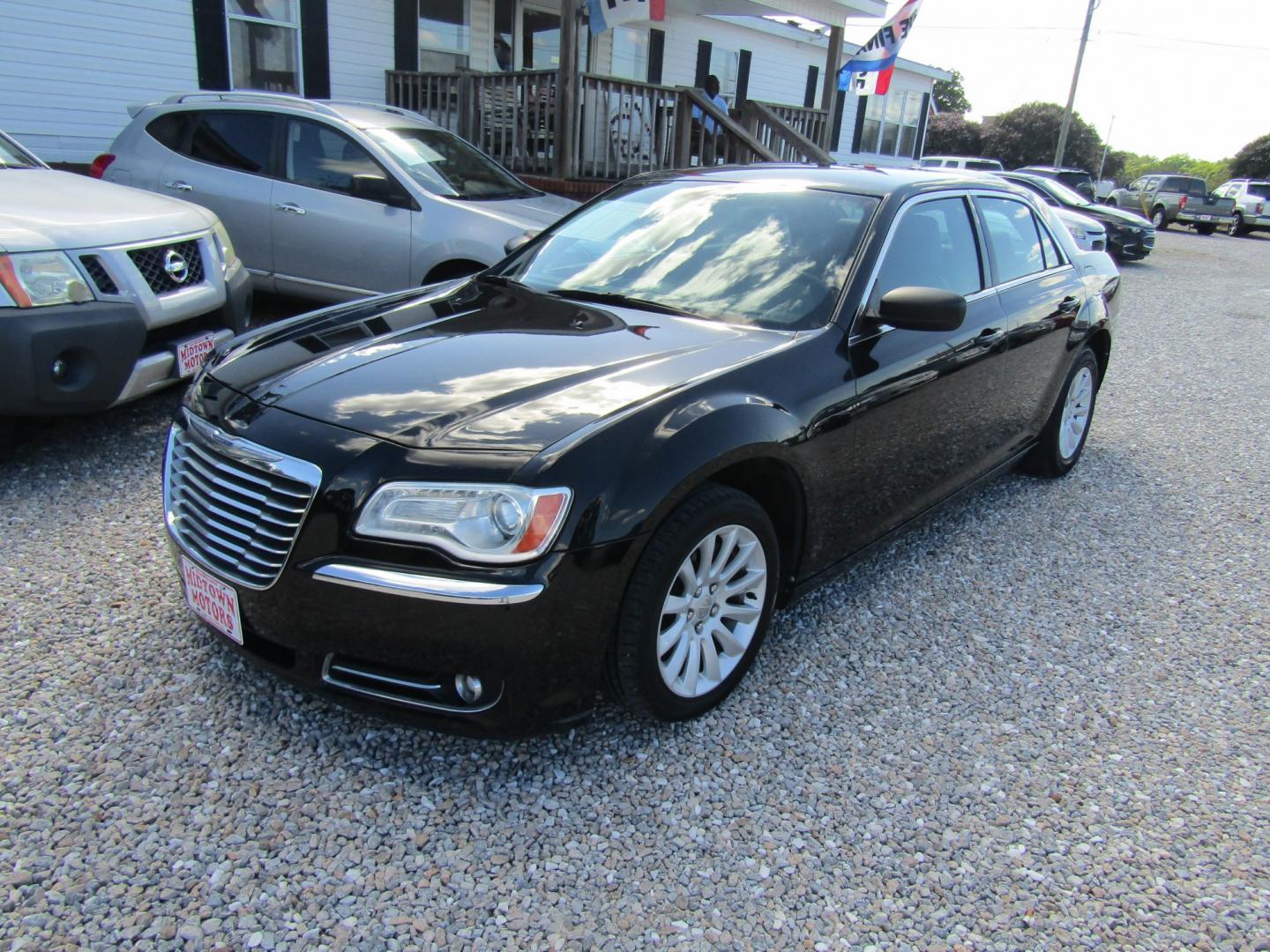 2014 Black Chrysler 300 RWD (2C3CCAAG9EH) with an 3.6L V6 SOHC 24V engine, Automatic transmission, located at 15016 S Hwy 231, Midland City, AL, 36350, (334) 983-3001, 31.306210, -85.495277- Photo#2