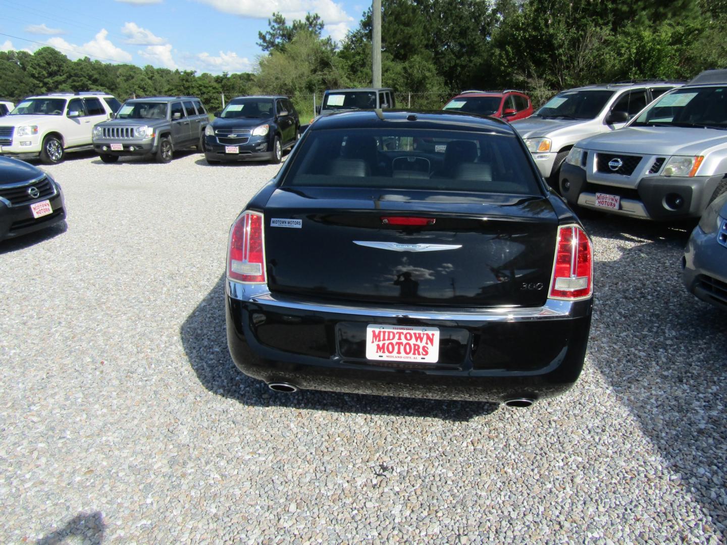 2014 Black Chrysler 300 RWD (2C3CCAAG9EH) with an 3.6L V6 SOHC 24V engine, Automatic transmission, located at 15016 S Hwy 231, Midland City, AL, 36350, (334) 983-3001, 31.306210, -85.495277- Photo#6