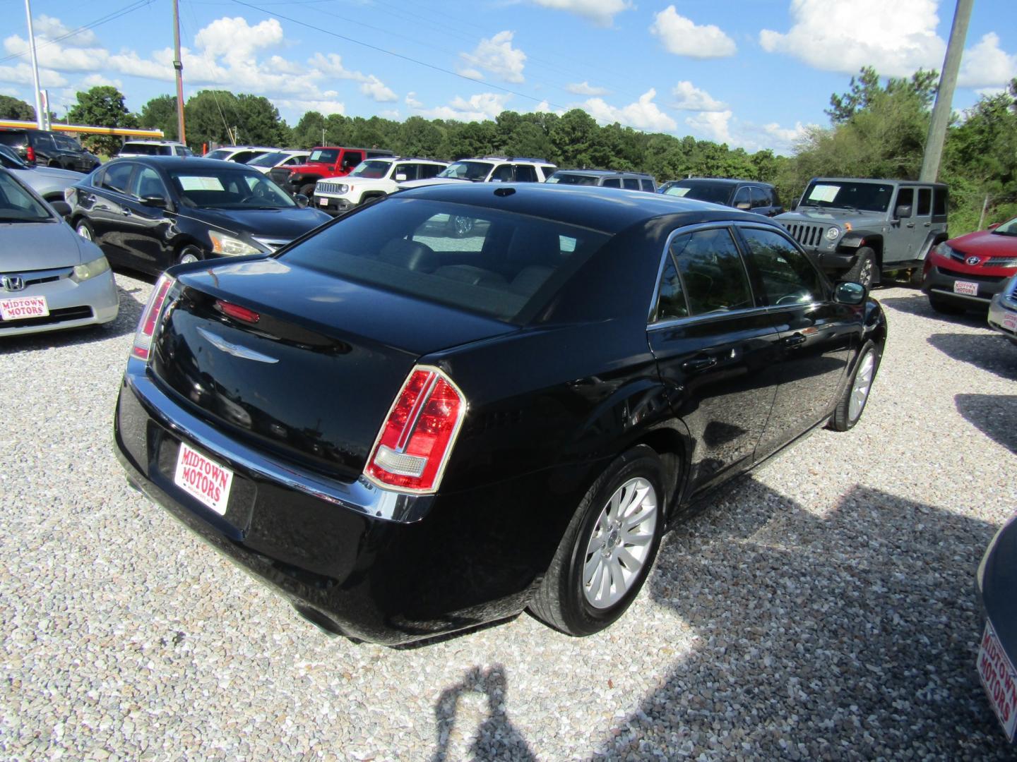 2014 Black Chrysler 300 RWD (2C3CCAAG9EH) with an 3.6L V6 SOHC 24V engine, Automatic transmission, located at 15016 S Hwy 231, Midland City, AL, 36350, (334) 983-3001, 31.306210, -85.495277- Photo#7