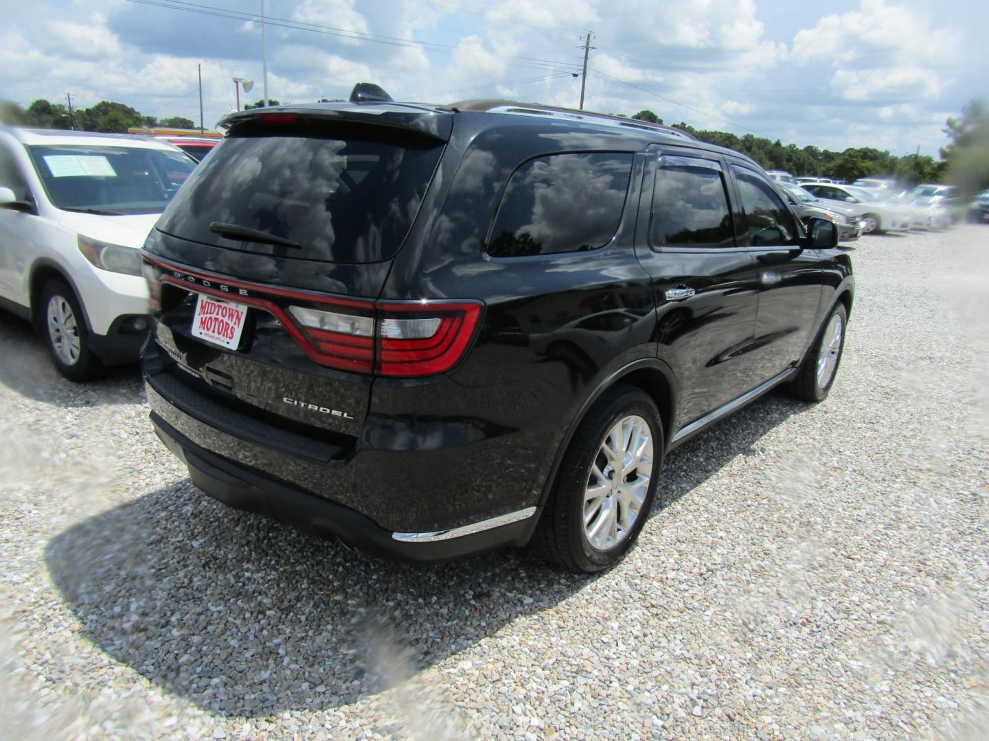 2015 Black Dodge Durango Citadel 2WD (1C4RDHEG9FC) with an 3.6L V6 DOHC 24V engine, Automatic transmission, located at 15016 S Hwy 231, Midland City, AL, 36350, (334) 983-3001, 31.306210, -85.495277- Photo#6