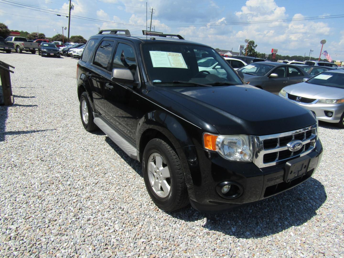 2012 Black Ford Escape XLT FWD (1FMCU0D74CK) with an 2.5L L4 DOHC 16V engine, Automatic transmission, located at 15016 S Hwy 231, Midland City, AL, 36350, (334) 983-3001, 31.306210, -85.495277- Photo#0