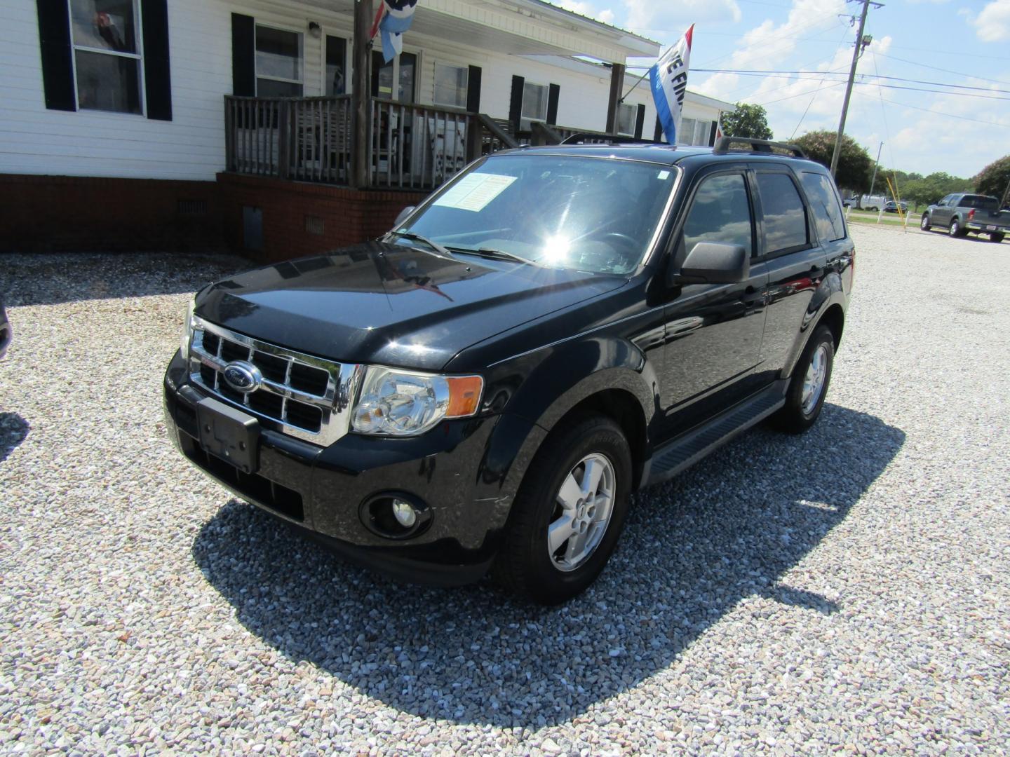 2012 Black Ford Escape XLT FWD (1FMCU0D74CK) with an 2.5L L4 DOHC 16V engine, Automatic transmission, located at 15016 S Hwy 231, Midland City, AL, 36350, (334) 983-3001, 31.306210, -85.495277- Photo#2