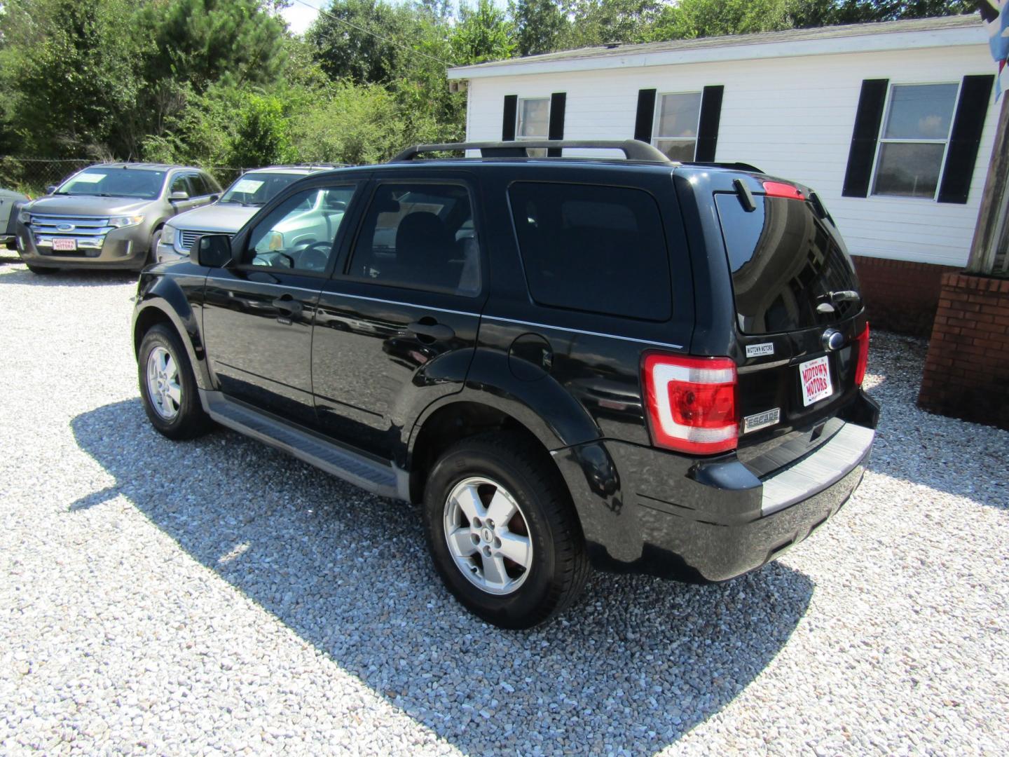 2012 Black Ford Escape XLT FWD (1FMCU0D74CK) with an 2.5L L4 DOHC 16V engine, Automatic transmission, located at 15016 S Hwy 231, Midland City, AL, 36350, (334) 983-3001, 31.306210, -85.495277- Photo#5