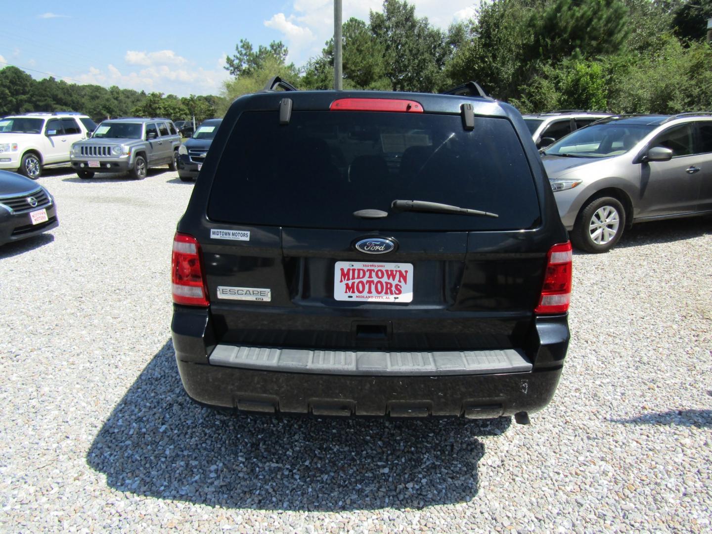2012 Black Ford Escape XLT FWD (1FMCU0D74CK) with an 2.5L L4 DOHC 16V engine, Automatic transmission, located at 15016 S Hwy 231, Midland City, AL, 36350, (334) 983-3001, 31.306210, -85.495277- Photo#6