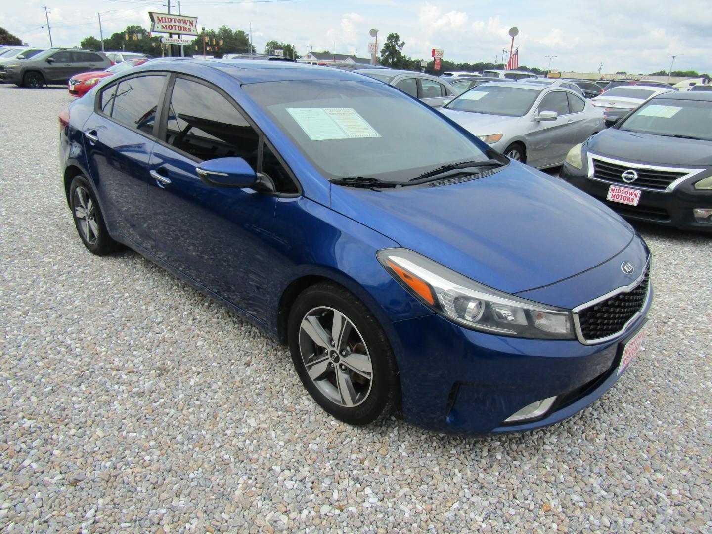 2018 Blue Kia Forte LX 6M (3KPFL4A72JE) with an 2.0L L4 DOHC 16V engine, Automatic transmission, located at 15016 S Hwy 231, Midland City, AL, 36350, (334) 983-3001, 31.306210, -85.495277- Photo#0