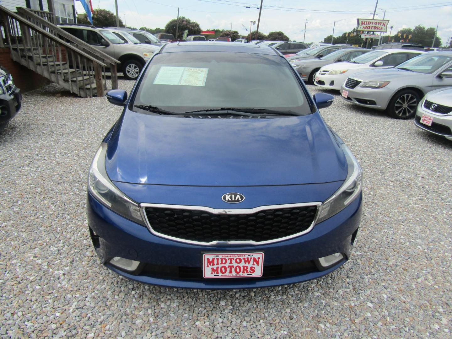 2018 Blue Kia Forte LX 6M (3KPFL4A72JE) with an 2.0L L4 DOHC 16V engine, Automatic transmission, located at 15016 S Hwy 231, Midland City, AL, 36350, (334) 983-3001, 31.306210, -85.495277- Photo#1