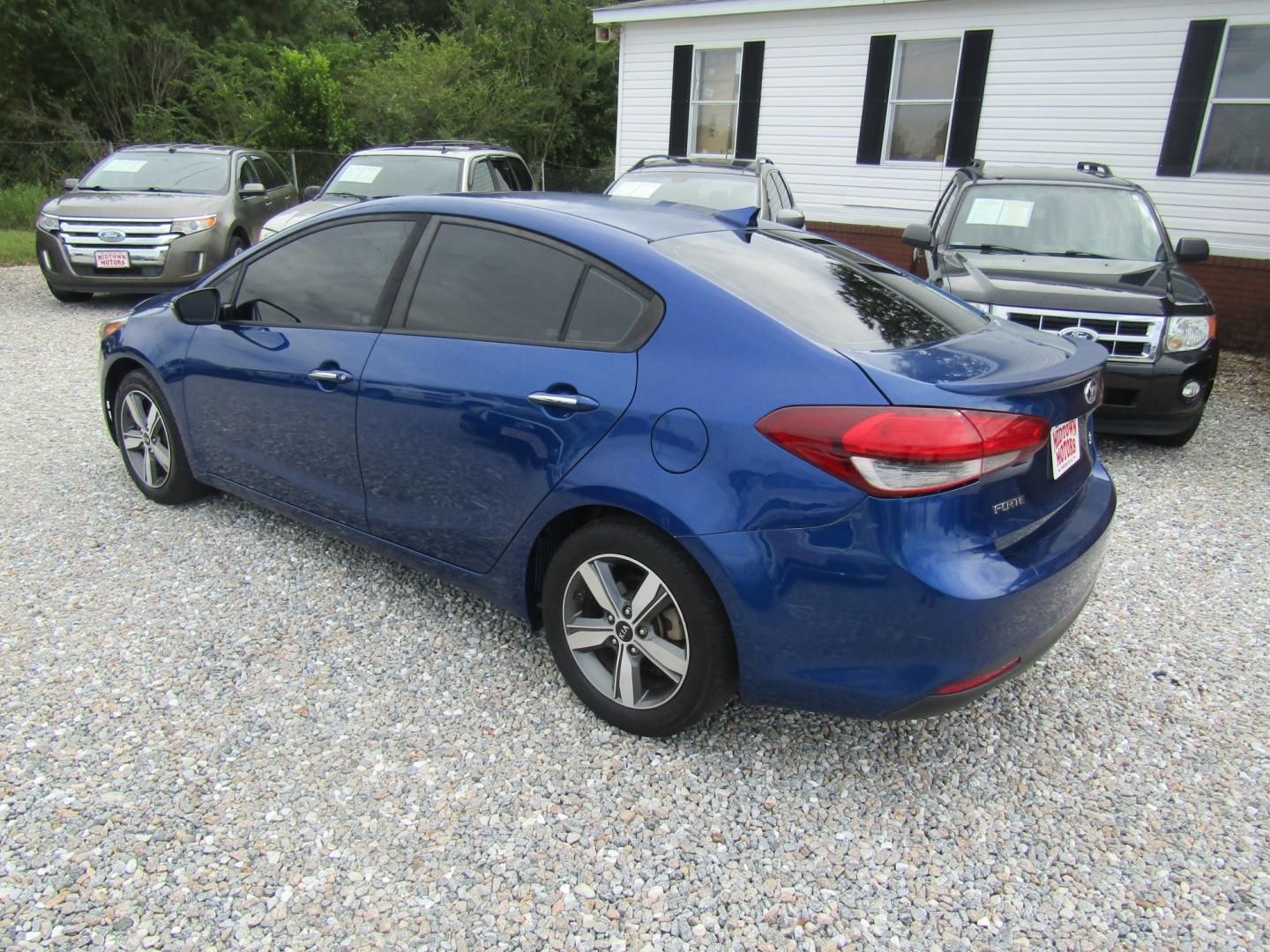 2018 Blue Kia Forte LX 6M (3KPFL4A72JE) with an 2.0L L4 DOHC 16V engine, Automatic transmission, located at 15016 S Hwy 231, Midland City, AL, 36350, (334) 983-3001, 31.306210, -85.495277- Photo#5