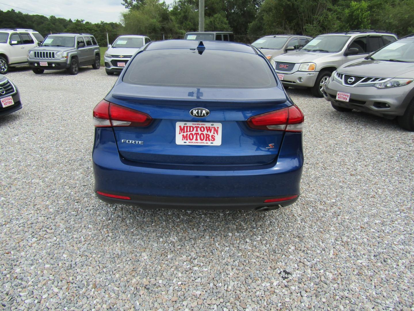 2018 Blue Kia Forte LX 6M (3KPFL4A72JE) with an 2.0L L4 DOHC 16V engine, Automatic transmission, located at 15016 S Hwy 231, Midland City, AL, 36350, (334) 983-3001, 31.306210, -85.495277- Photo#6