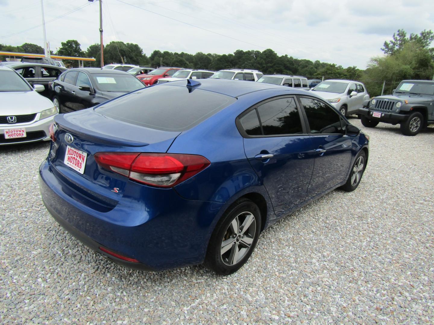 2018 Blue Kia Forte LX 6M (3KPFL4A72JE) with an 2.0L L4 DOHC 16V engine, Automatic transmission, located at 15016 S Hwy 231, Midland City, AL, 36350, (334) 983-3001, 31.306210, -85.495277- Photo#7