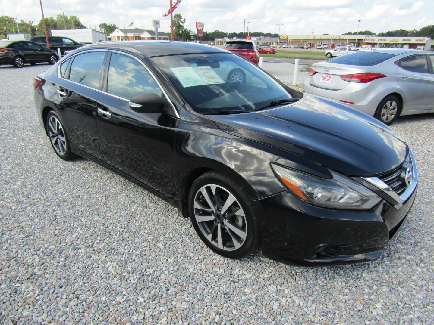 2017 Black Nissan Altima 2.5 S (1N4AL3AP9HC) with an 2.5L L4 DOHC 16V engine, Automatic transmission, located at 15016 S Hwy 231, Midland City, AL, 36350, (334) 983-3001, 31.306210, -85.495277- Photo#0