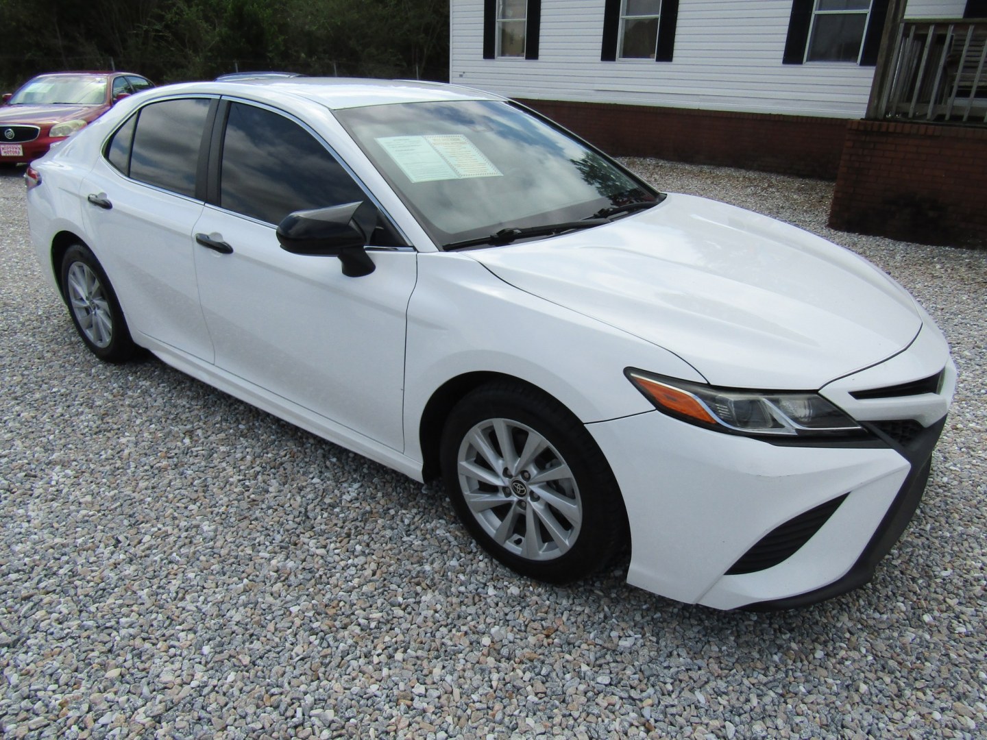 2018 White Toyota Camry LE (4T1B11HK9JU) with an 2.5L L4 DOHC 16V engine, Automatic transmission, located at 15016 S Hwy 231, Midland City, AL, 36350, (334) 983-3001, 31.306210, -85.495277- Photo#0