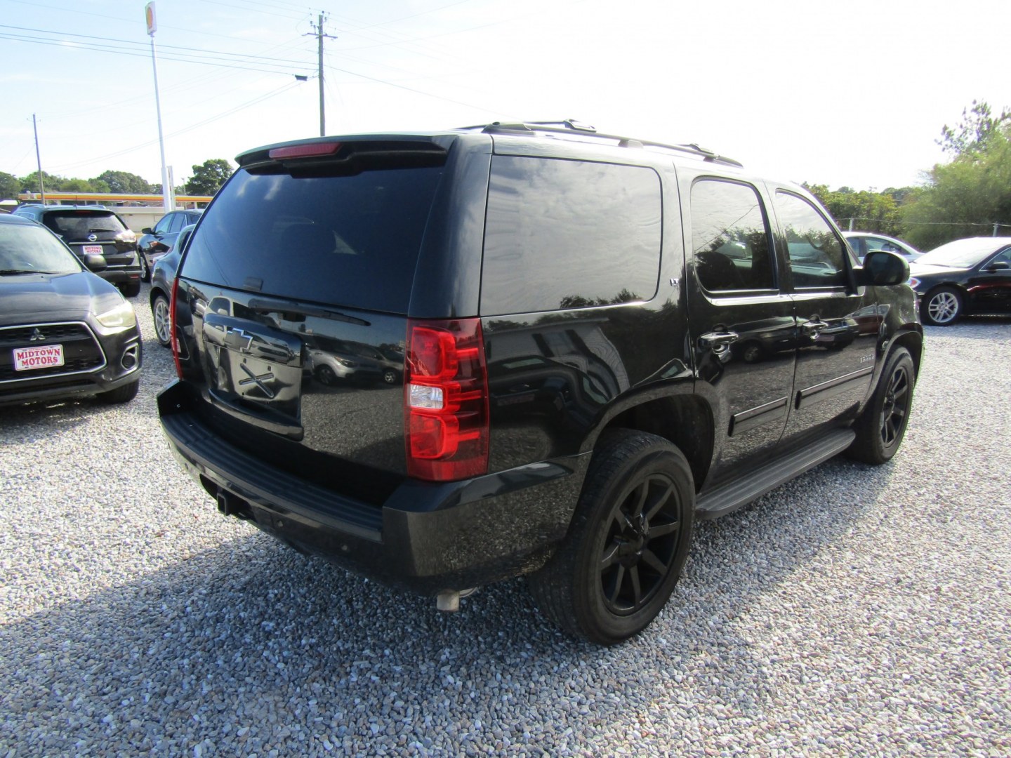 2013 Black Chevrolet Tahoe LT 2WD (1GNSCBE06DR) with an 5.3L V8 OHV 16V FFV engine, Automatic transmission, located at 15016 S Hwy 231, Midland City, AL, 36350, (334) 983-3001, 31.306210, -85.495277- Photo#7
