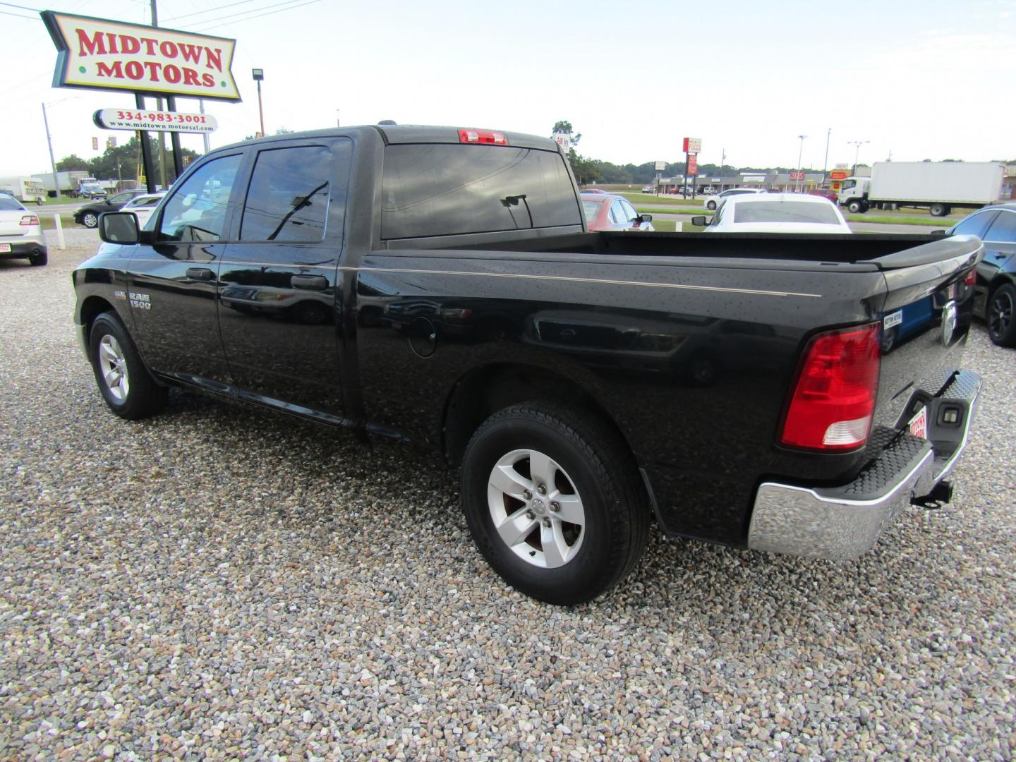 2015 Black Ram 1500 Tradesman Crew Cab LWB 2WD (1C6RR6ST8FS) with an 5.7L V8 OHV 16V engine, Automatic transmission, located at 15016 S Hwy 231, Midland City, AL, 36350, (334) 983-3001, 31.306210, -85.495277- Photo#4