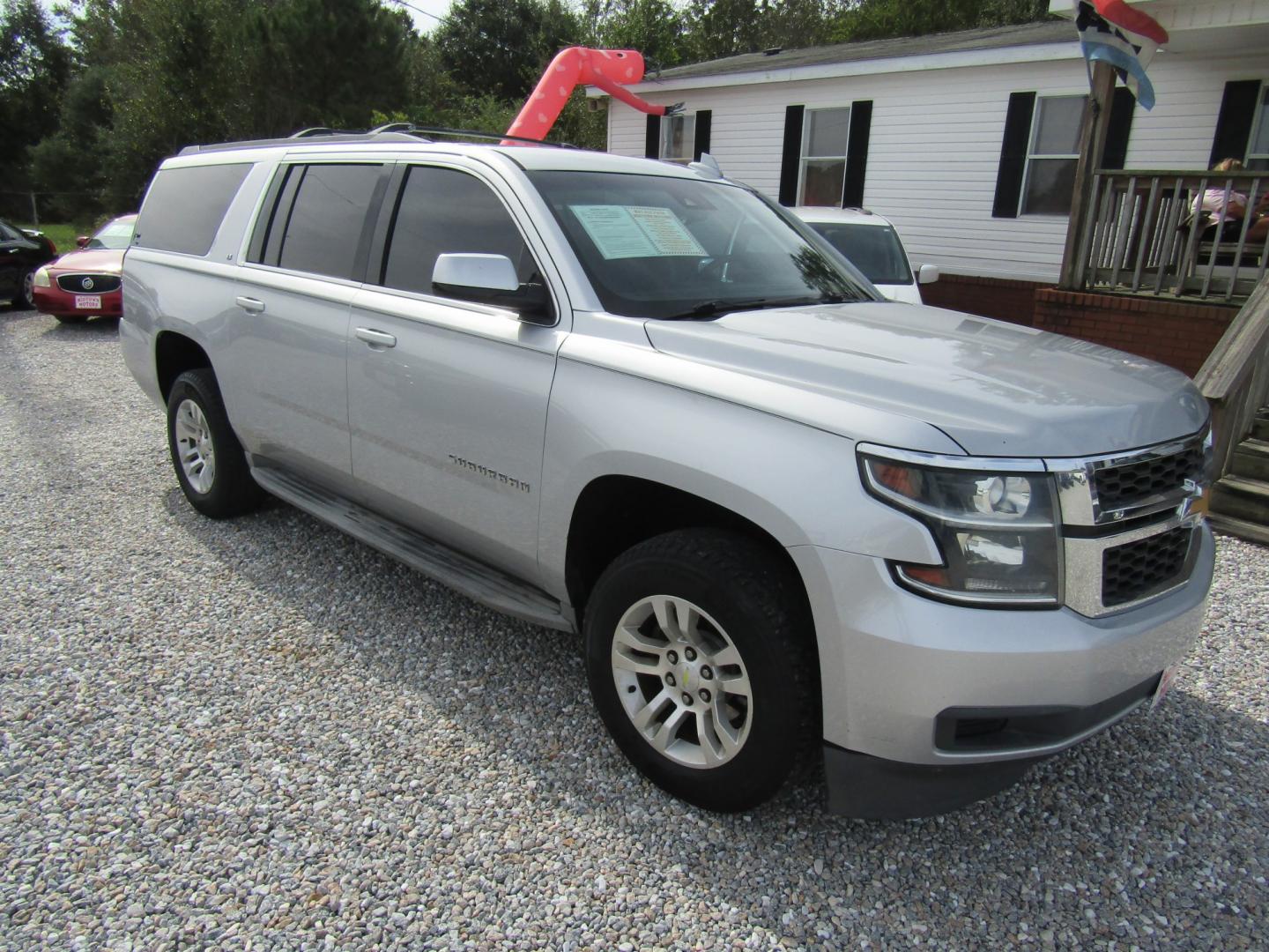 2016 Silver Chevrolet Suburban LT 2WD (1GNSCHKC5GR) with an 5.3L V8 OHV 16V engine, Automatic transmission, located at 15016 S Hwy 231, Midland City, AL, 36350, (334) 983-3001, 31.306210, -85.495277- Photo#0