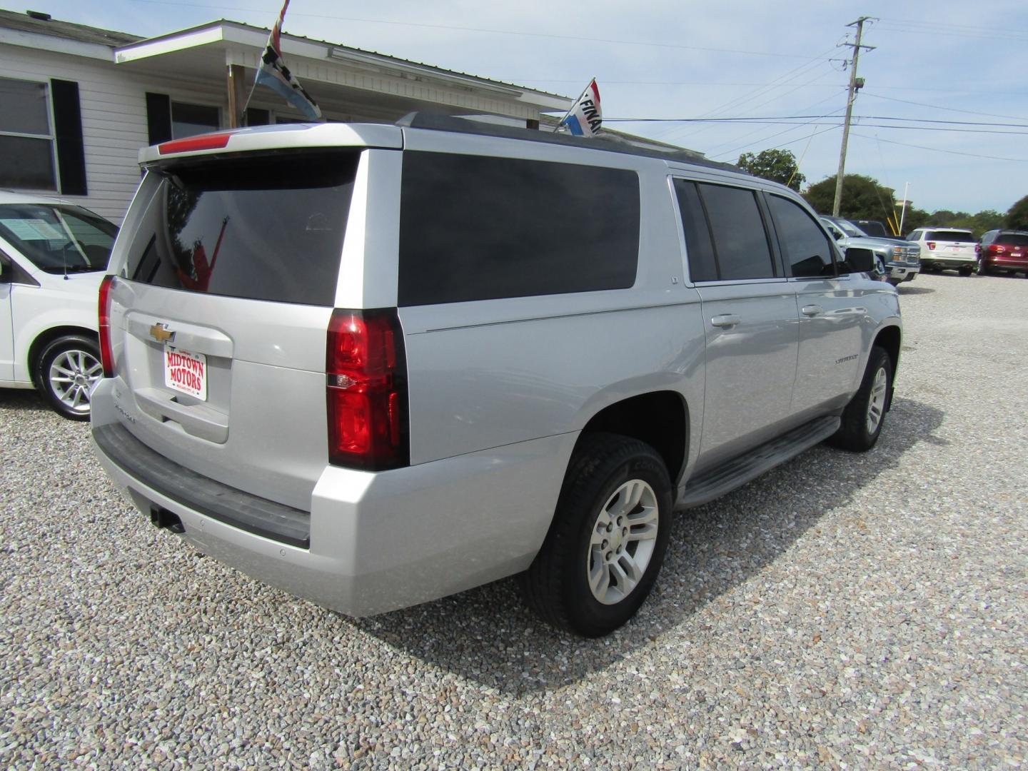 2016 Silver Chevrolet Suburban LT 2WD (1GNSCHKC5GR) with an 5.3L V8 OHV 16V engine, Automatic transmission, located at 15016 S Hwy 231, Midland City, AL, 36350, (334) 983-3001, 31.306210, -85.495277- Photo#6