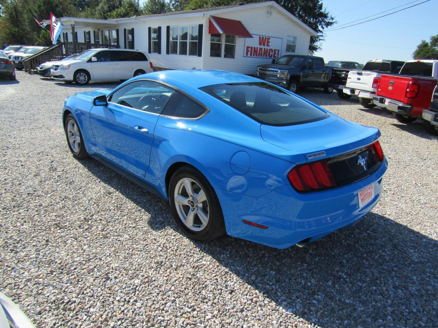 2017 Blue Ford Mustang V6 Coupe (1FA6P8AM3H5) with an 3.7L V6 DOHC 24V engine, Automatic transmission, located at 15016 S Hwy 231, Midland City, AL, 36350, (334) 983-3001, 31.306210, -85.495277- Photo#4