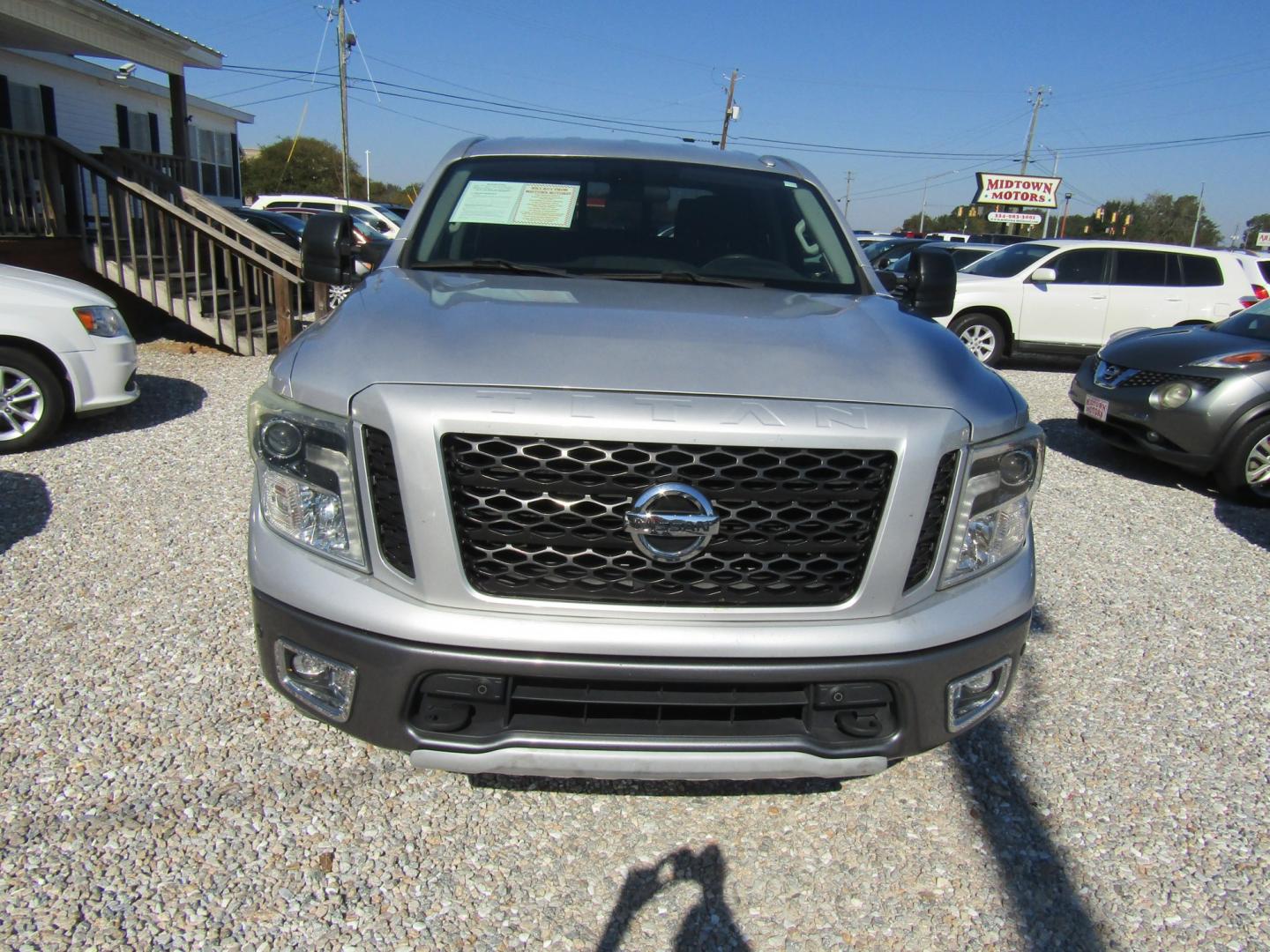 2018 Silver Nissan Titan PRO-4X Crew Cab 4WD (1N6AA1E59JN) with an 5.6L V8 DOHC 32V engine, Automatic transmission, located at 15016 S Hwy 231, Midland City, AL, 36350, (334) 983-3001, 31.306210, -85.495277- Photo#1