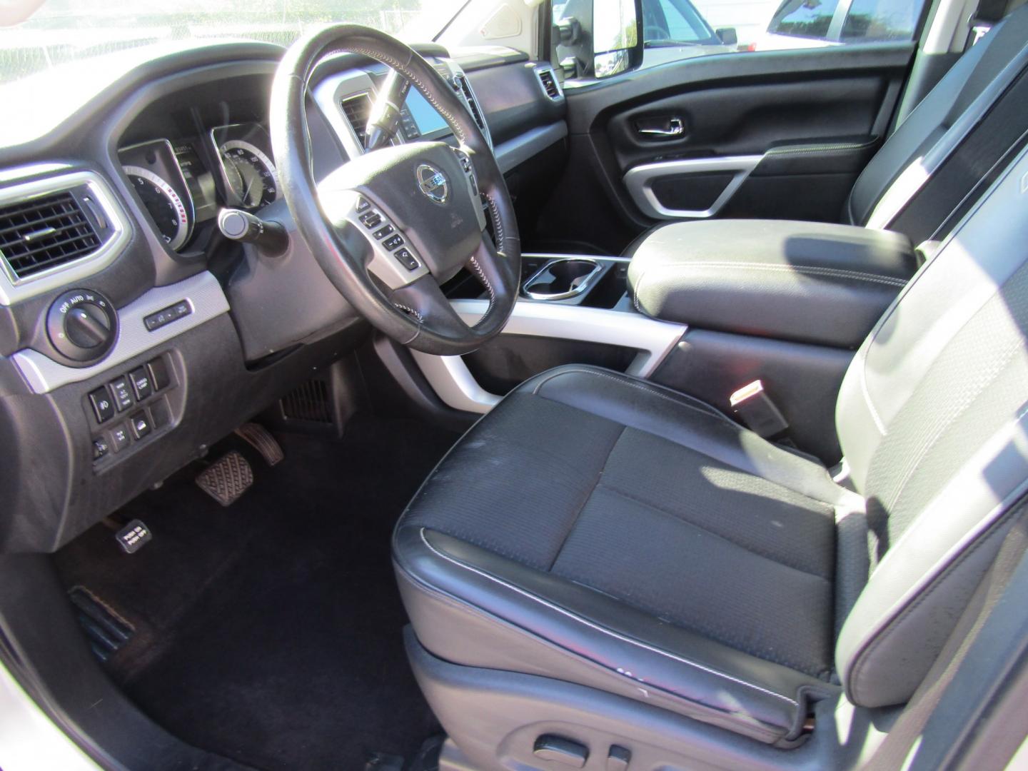 2018 Silver Nissan Titan PRO-4X Crew Cab 4WD (1N6AA1E59JN) with an 5.6L V8 DOHC 32V engine, Automatic transmission, located at 15016 S Hwy 231, Midland City, AL, 36350, (334) 983-3001, 31.306210, -85.495277- Photo#3