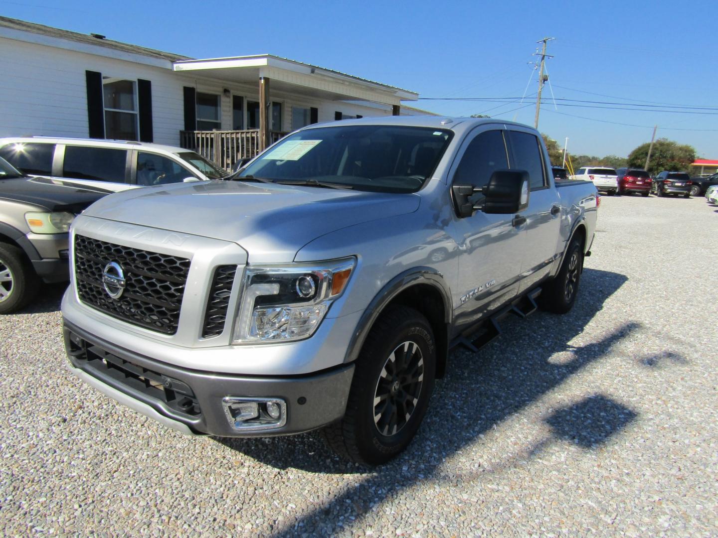 2018 Silver Nissan Titan PRO-4X Crew Cab 4WD (1N6AA1E59JN) with an 5.6L V8 DOHC 32V engine, Automatic transmission, located at 15016 S Hwy 231, Midland City, AL, 36350, (334) 983-3001, 31.306210, -85.495277- Photo#2