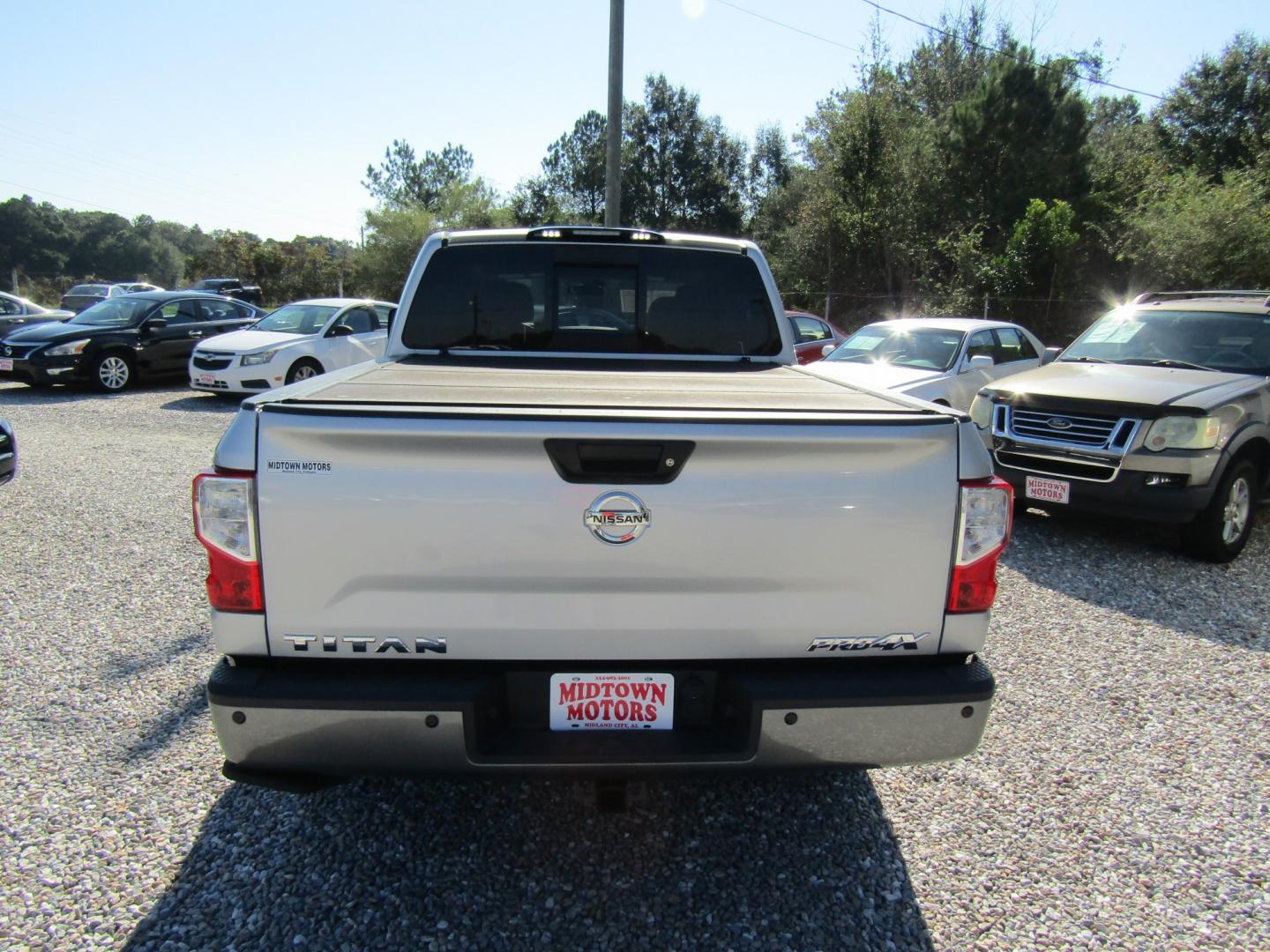 2018 Silver Nissan Titan PRO-4X Crew Cab 4WD (1N6AA1E59JN) with an 5.6L V8 DOHC 32V engine, Automatic transmission, located at 15016 S Hwy 231, Midland City, AL, 36350, (334) 983-3001, 31.306210, -85.495277- Photo#6