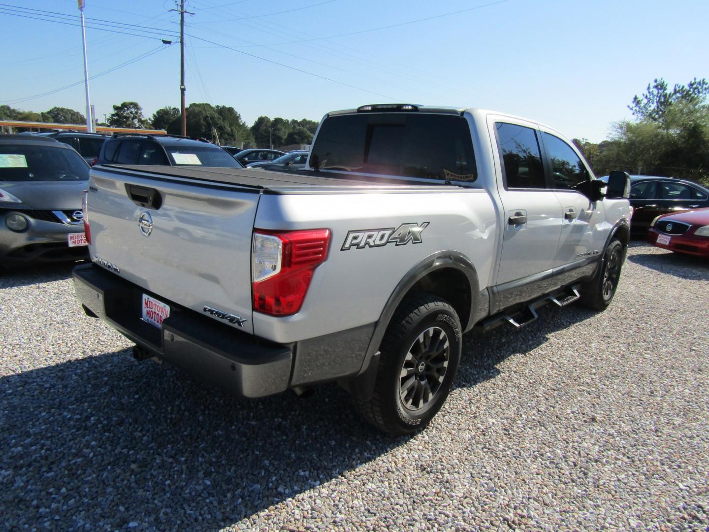 2018 Silver Nissan Titan PRO-4X Crew Cab 4WD (1N6AA1E59JN) with an 5.6L V8 DOHC 32V engine, Automatic transmission, located at 15016 S Hwy 231, Midland City, AL, 36350, (334) 983-3001, 31.306210, -85.495277- Photo#7