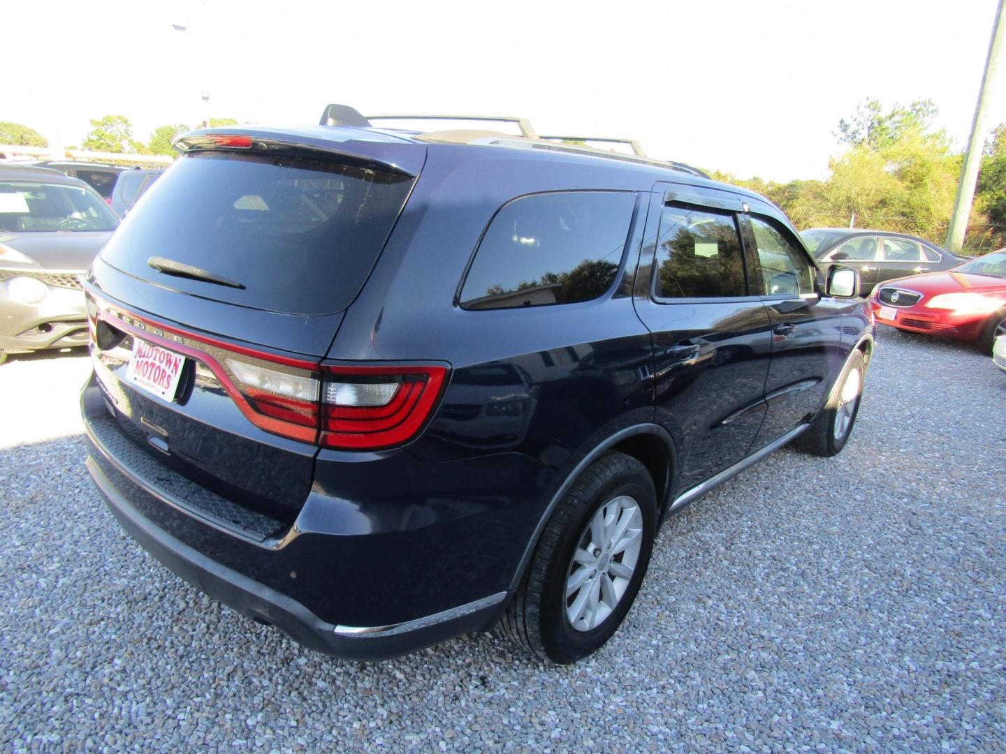 2015 Blue Dodge Durango SXT RWD (1C4RDHAG1FC) with an 3.6L V6 DOHC 24V engine, Automatic transmission, located at 15016 S Hwy 231, Midland City, AL, 36350, (334) 983-3001, 31.306210, -85.495277- Photo#6