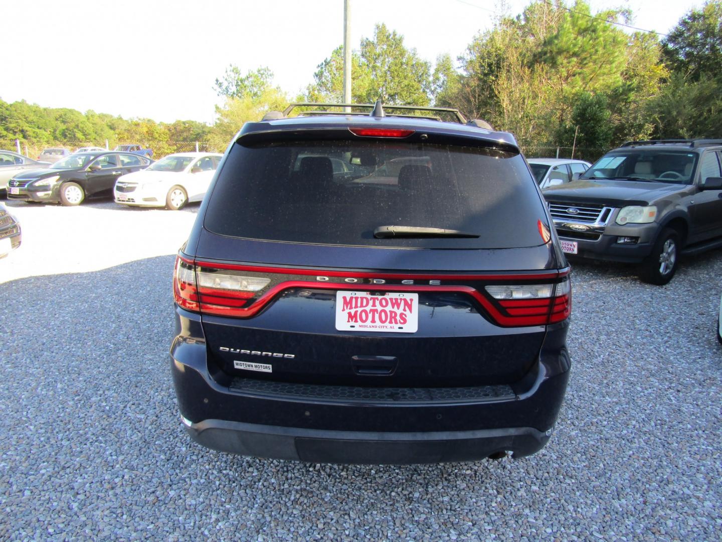 2015 Blue Dodge Durango SXT RWD (1C4RDHAG1FC) with an 3.6L V6 DOHC 24V engine, Automatic transmission, located at 15016 S Hwy 231, Midland City, AL, 36350, (334) 983-3001, 31.306210, -85.495277- Photo#5