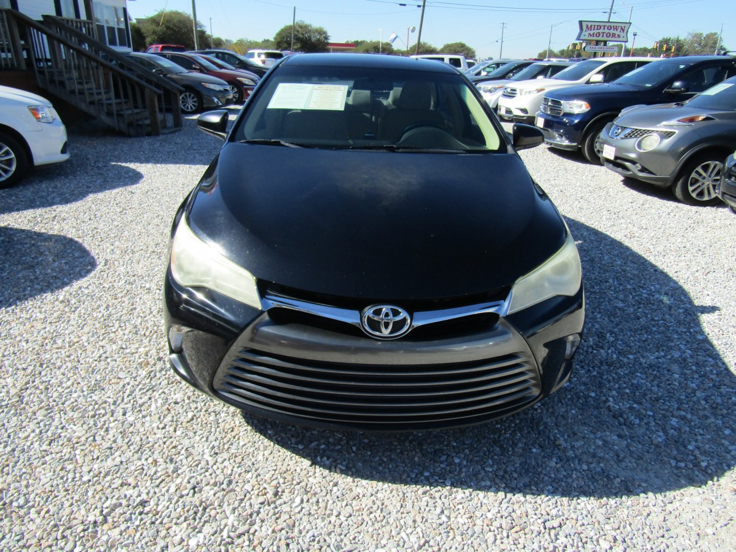2016 Black Toyota Camry SE (4T1BF1FK2GU) with an 2.5L L4 DOHC 16V engine, Automatic transmission, located at 15016 S Hwy 231, Midland City, AL, 36350, (334) 983-3001, 31.306210, -85.495277- Photo#1