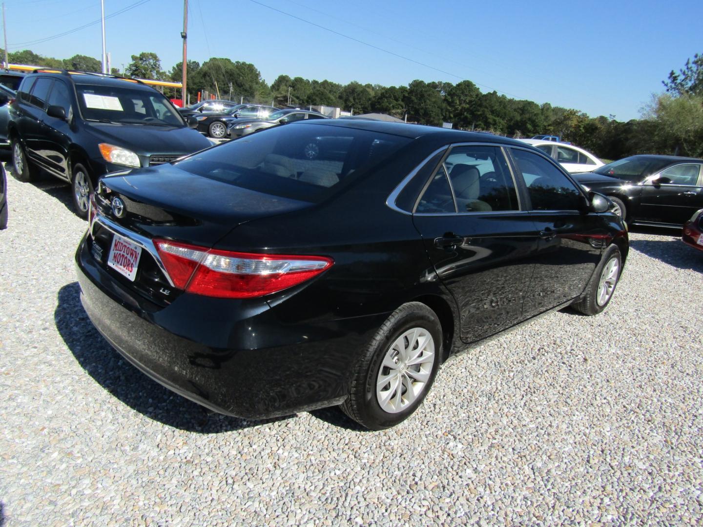2016 Black Toyota Camry SE (4T1BF1FK2GU) with an 2.5L L4 DOHC 16V engine, Automatic transmission, located at 15016 S Hwy 231, Midland City, AL, 36350, (334) 983-3001, 31.306210, -85.495277- Photo#7