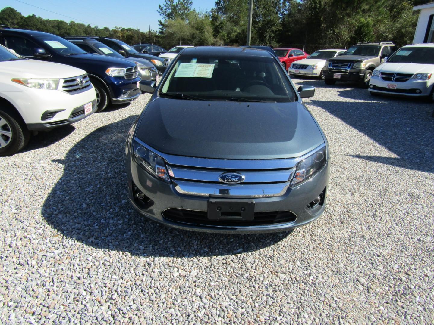 2012 Blue Ford Fusion SEL (3FAHP0JA9CR) with an 2.5L L4 DOHC 16V engine, Automatic transmission, located at 15016 S Hwy 231, Midland City, AL, 36350, (334) 983-3001, 31.306210, -85.495277- Photo#1
