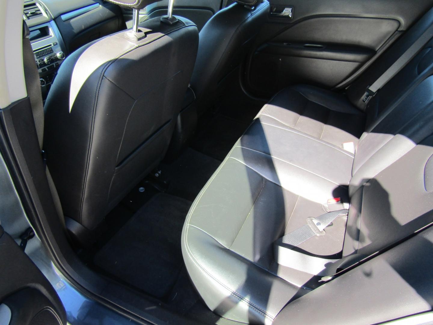 2012 Blue Ford Fusion SEL (3FAHP0JA9CR) with an 2.5L L4 DOHC 16V engine, Automatic transmission, located at 15016 S Hwy 231, Midland City, AL, 36350, (334) 983-3001, 31.306210, -85.495277- Photo#4