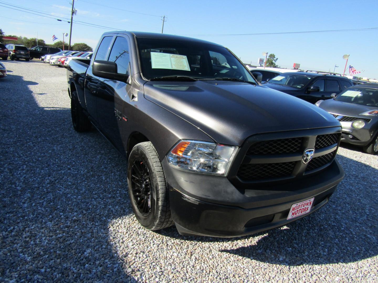 2019 Gray Ram 1500 Tradesman Quad Cab 2WD (1C6RR6FT4KS) with an 5.7L V8 OHV 16V engine, Automatic transmission, located at 15016 S Hwy 231, Midland City, AL, 36350, (334) 983-3001, 31.306210, -85.495277- Photo#0
