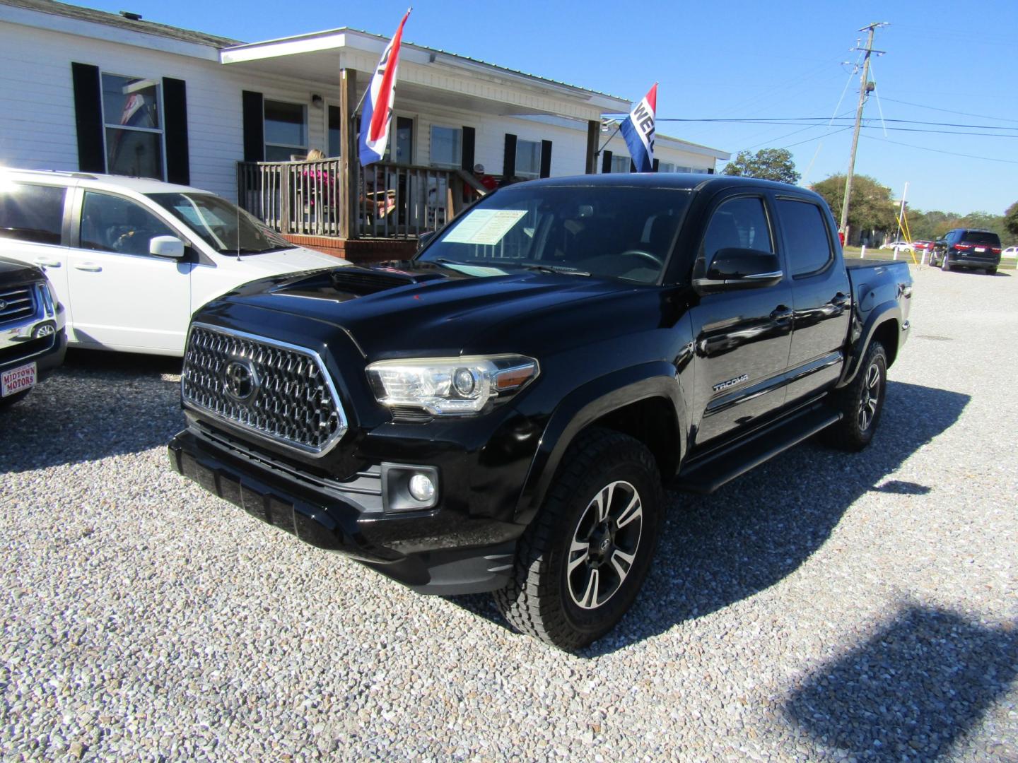 2018 Black Toyota Tacoma SR5 Double Cab Long Bed V6 6AT 2WD (3TMAZ5CN9JM) with an 3.6L V6 DOHC 24V engine, Automatic transmission, located at 15016 S Hwy 231, Midland City, AL, 36350, (334) 983-3001, 31.306210, -85.495277- Photo#2