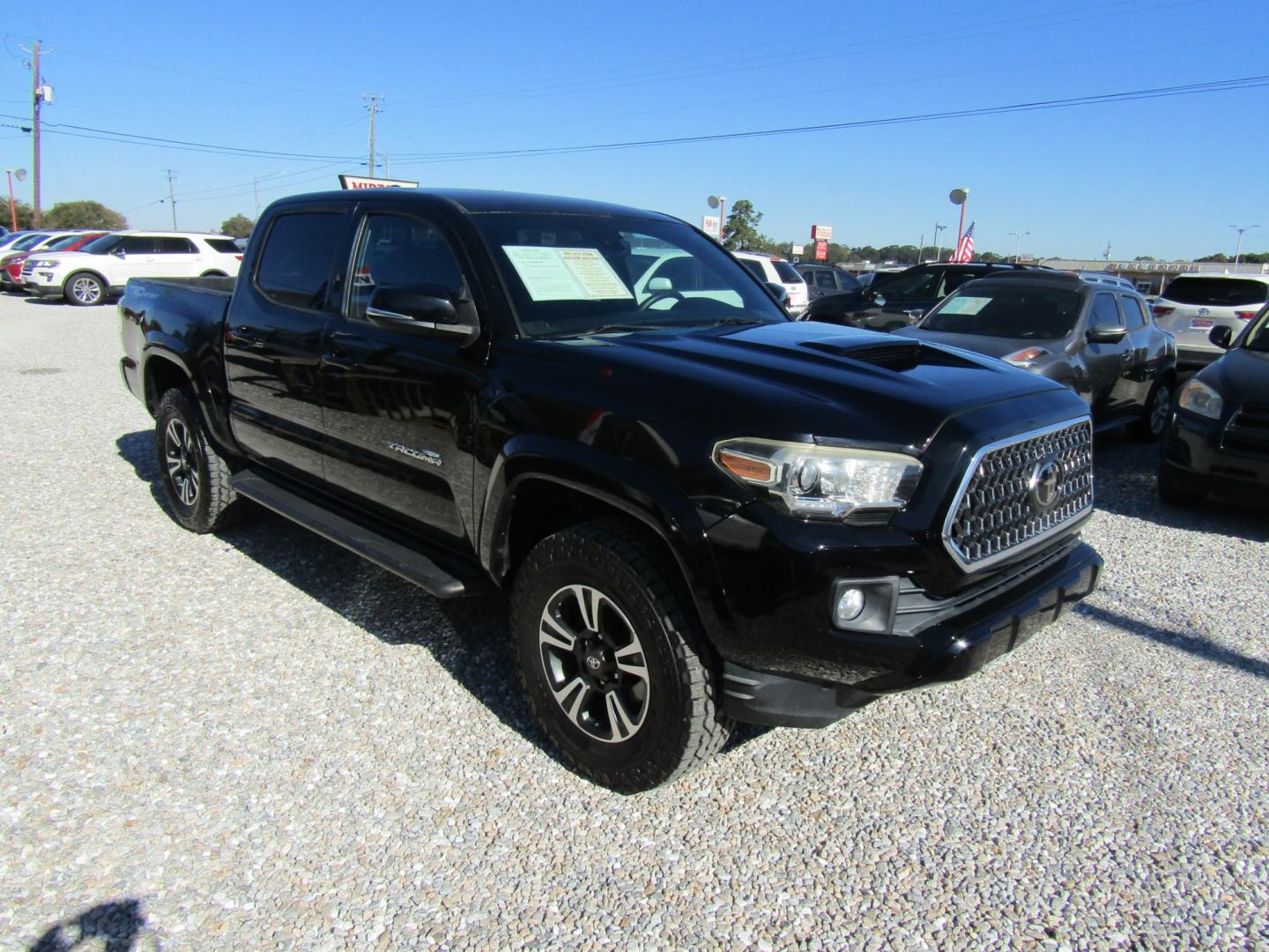 2018 Black Toyota Tacoma SR5 Double Cab Long Bed V6 6AT 2WD (3TMAZ5CN9JM) with an 3.6L V6 DOHC 24V engine, Automatic transmission, located at 15016 S Hwy 231, Midland City, AL, 36350, (334) 983-3001, 31.306210, -85.495277- Photo#0