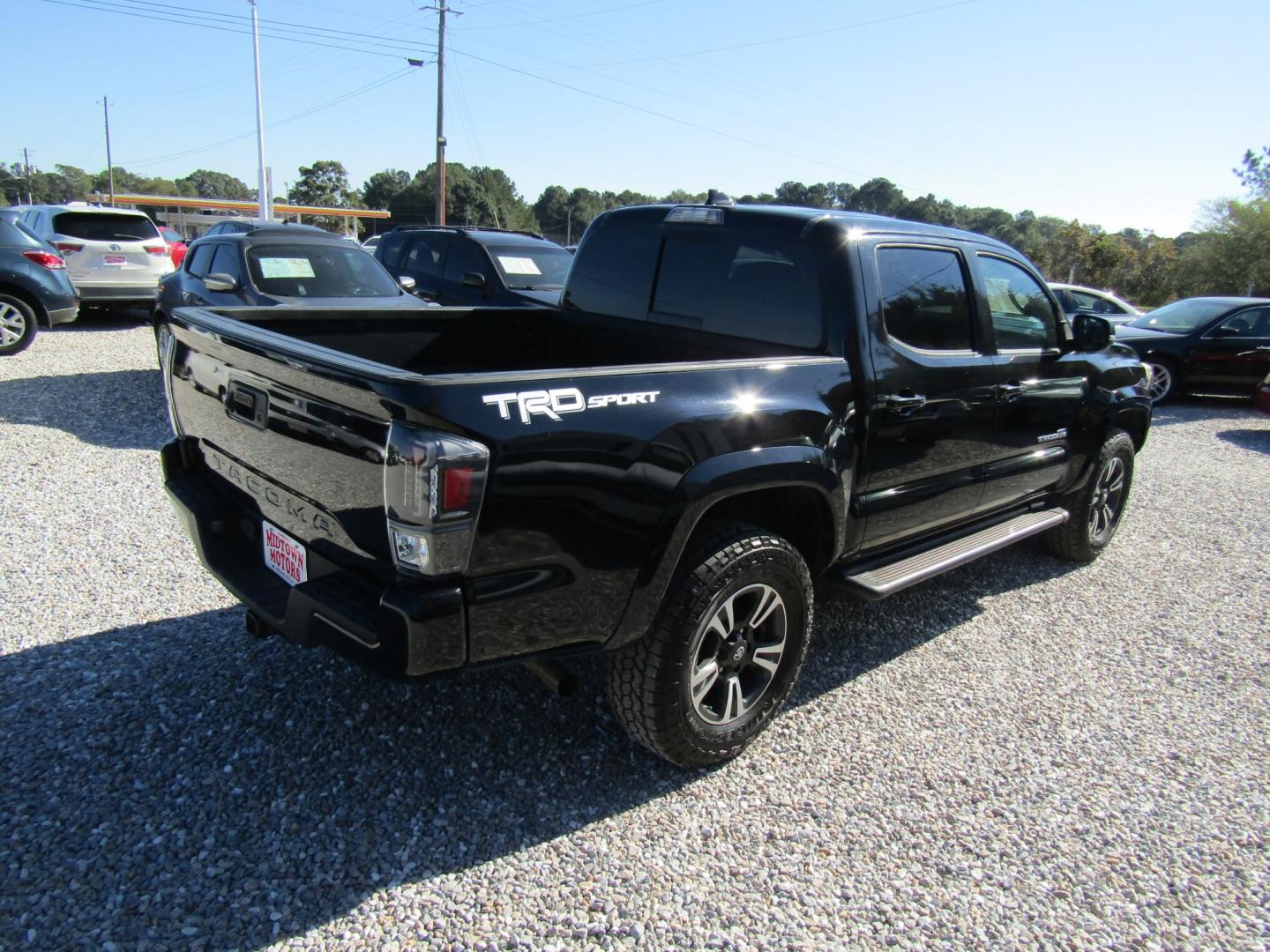 2018 Black Toyota Tacoma SR5 Double Cab Long Bed V6 6AT 2WD (3TMAZ5CN9JM) with an 3.6L V6 DOHC 24V engine, Automatic transmission, located at 15016 S Hwy 231, Midland City, AL, 36350, (334) 983-3001, 31.306210, -85.495277- Photo#7